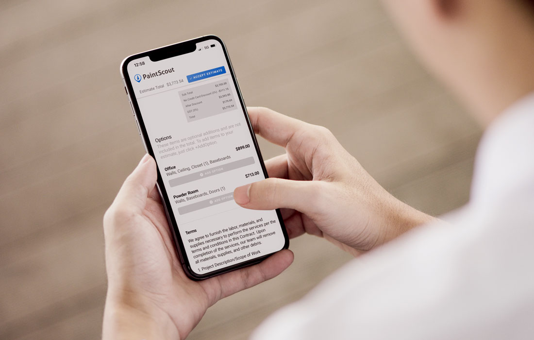 Women customer holding phone that shows optional items